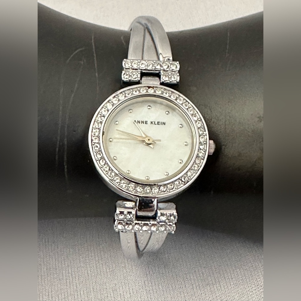 Anne Klein silver tone watch with crystal bezel and bracelet band